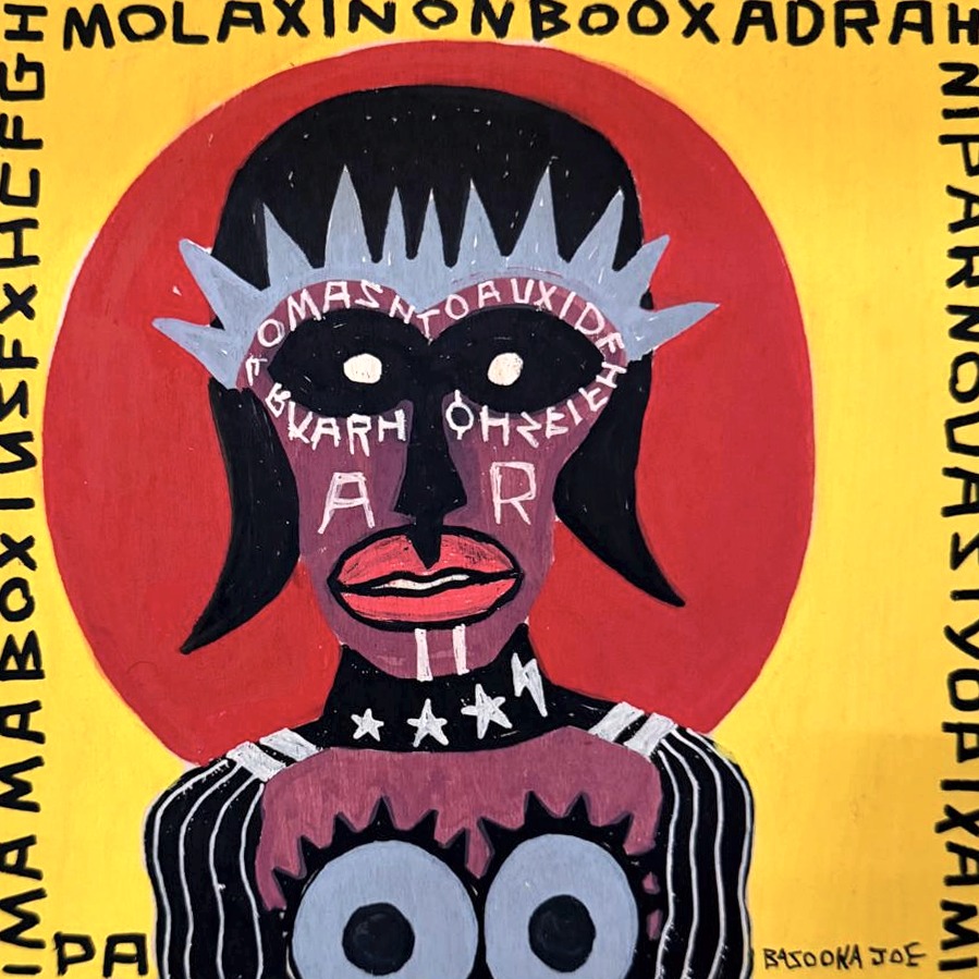 Molaxinon by Bazooka Joe. A pink-faced figure in a pale blue spiked crown inside a red disc on yellow, invented letters around the border