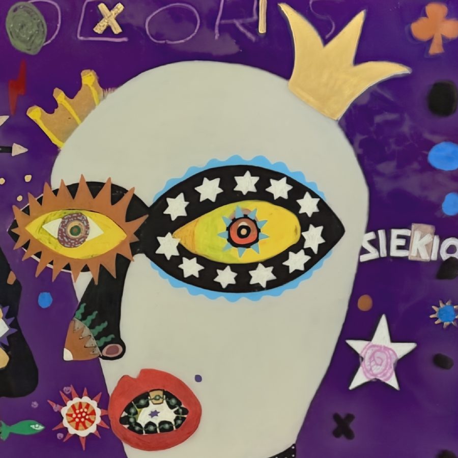 Crowned head and star mask, detail