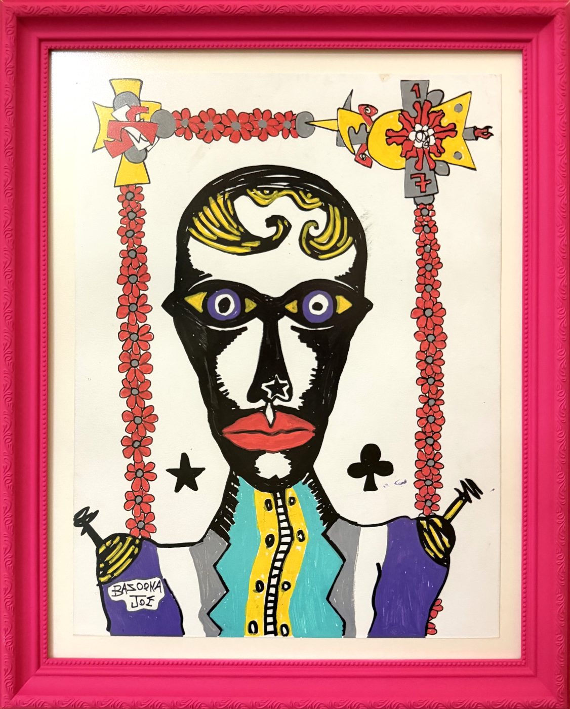 Jack of Clubs by Bazooka Joe. A black masked face with yellow hair under a red flower arch, a star and a club at his shoulders, in a pink frame made by the artist